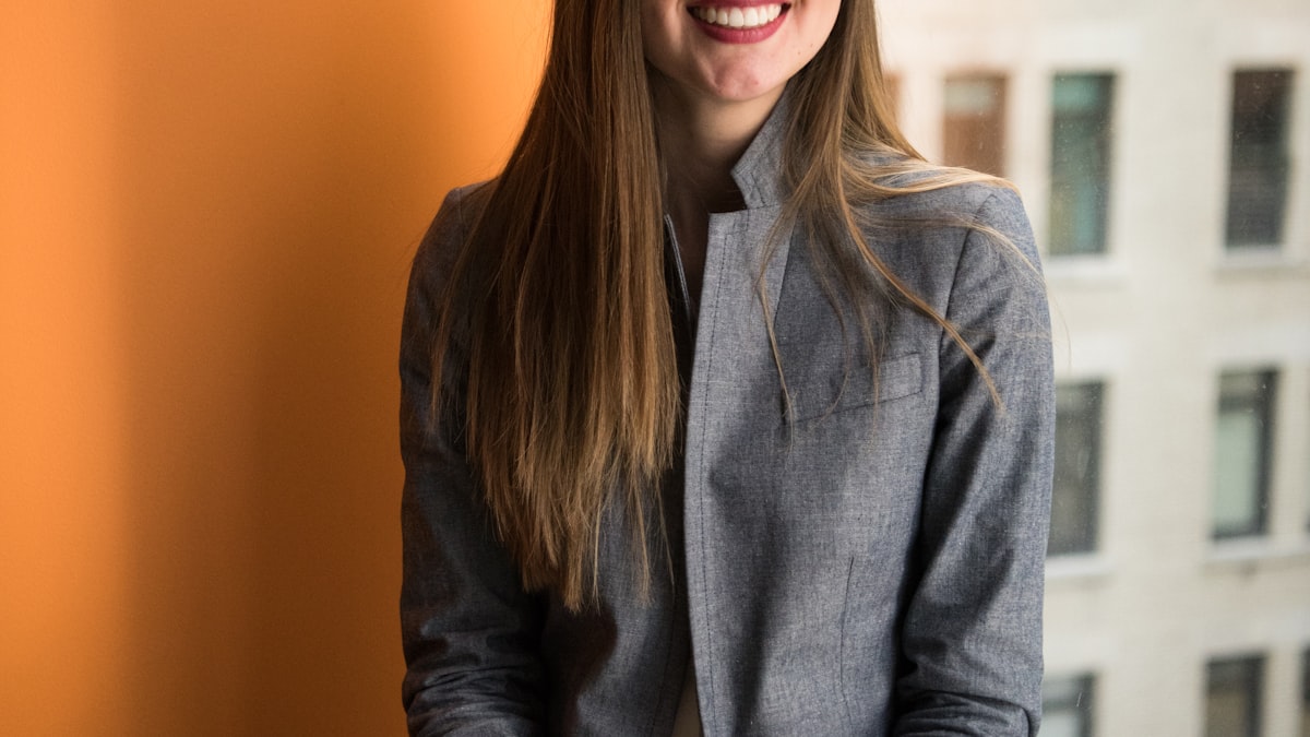 Mother returning to work after maternity leave discussing flexible arrangements with employer