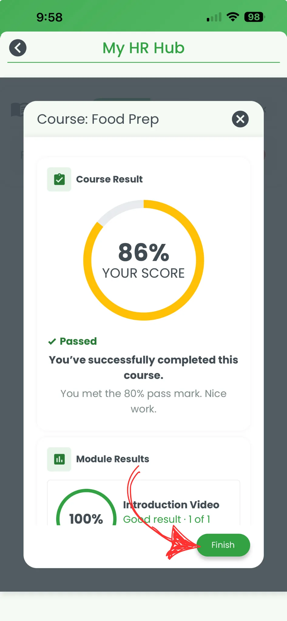 HR Hub training course results screen in the RosterElf app showing an 86% pass score with the Finish button circled in red